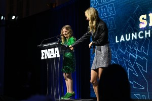 NEW YORK, NEW YORK - DECEMBER 04: Tepper Itzler and Amy Griffin speak onstage during the Footwear News Achievement Awards (FNAAs) 2024 at Cipriani South Street on December 04, 2024 in New York City. (Photo by Roy Rochlin/Footwear News via Getty Images)