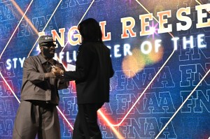 NEW YORK, NEW YORK - DECEMBER 04: Tobe Nwigwe and Angel Reese speak onstage during the Footwear News Achievement Awards (FNAAs) 2024 at Cipriani South Street on December 04, 2024 in New York City. (Photo by Roy Rochlin/Footwear News via Getty Images)