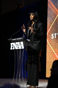 NEW YORK, NEW YORK - DECEMBER 04: Angel Reese speaks onstage during the Footwear News Achievement Awards (FNAAs) 2024 at Cipriani South Street on December 04, 2024 in New York City. (Photo by Roy Rochlin/Footwear News via Getty Images)