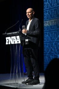 NEW YORK, NEW YORK - DECEMBER 04: Regis Schultz speaks onstage during the Footwear News Achievement Awards (FNAAs) 2024 at Cipriani South Street on December 04, 2024 in New York City. (Photo by Roy Rochlin/Footwear News via Getty Images)