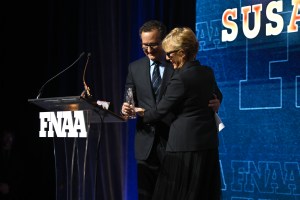 NEW YORK, NEW YORK - DECEMBER 04: Marc Fisher and Susan Itzkowitz speak onstage during the Footwear News Achievement Awards (FNAAs) 2024 at Cipriani South Street on December 04, 2024 in New York City. (Photo by Roy Rochlin/Footwear News via Getty Images)