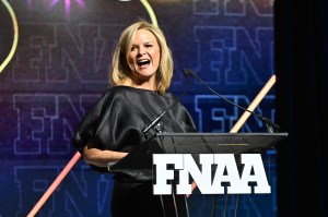 NEW YORK, NEW YORK - DECEMBER 04: Tacey Powers speaks onstage during the Footwear News Achievement Awards (FNAAs) 2024 at Cipriani South Street on December 04, 2024 in New York City. (Photo by Roy Rochlin/Footwear News via Getty Images)