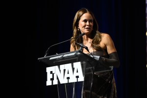 NEW YORK, NEW YORK - DECEMBER 04:  Brooke Burke speaks onstage during the Footwear News Achievement Awards (FNAAs) 2024 at Cipriani South Street on December 04, 2024 in New York City. (Photo by Roy Rochlin/Footwear News via Getty Images)