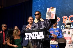 NEW YORK, NEW YORK - DECEMBER 04: Arne Freundt and A$AP Rocky speak onstage at the Footwear News Achievement Awards (FNAAs) 2024 at Cipriani South Street on December 04, 2024 in New York City. (Photo by Roy Rochlin/Footwear News via Getty Images)