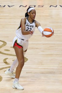 UNCASVILLE, CT - SEPTEMBER 18: Las Vegas Aces forward A'ja Wilson (22) passes the ball during game 4 of the 2022 WNBA Finals between Las Vegas Aces and Connecticut Sun on September 18, 2022, at Mohegan Sun Arena in Uncasville, CT. (Photo by M. Anthony Nesmith/Icon Sportswire via Getty Images)