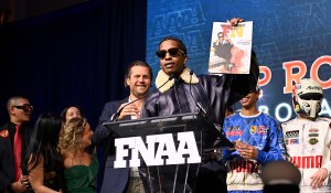 NEW YORK, NEW YORK - DECEMBER 04: Arne Freundt and A$AP Rocky speak onstage at the Footwear News Achievement Awards (FNAAs) 2024 at Cipriani South Street on December 04, 2024 in New York City. (Photo by Roy Rochlin/Footwear News via Getty Images)