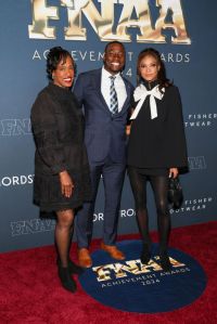 NEW YORK, NEW YORK - DECEMBER 04: (L-R) Jackie Joyner-Kersee, Grant Holloway and Gabby Thomas attend the 38th Annual Footwear News Achievement Awards at Cipriani South Street on December 04, 2024 in New York City. (Photo by Dia Dipasupil/Getty Images)