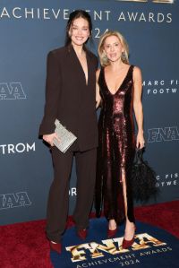 NEW YORK, NEW YORK - DECEMBER 04: (L-R) Emily DiDonato and Marina Larroudé attend the 38th Annual Footwear News Achievement Awards at Cipriani South Street on December 04, 2024 in New York City. (Photo by Dia Dipasupil/Getty Images)