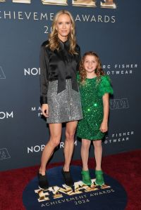 NEW YORK, NEW YORK - DECEMBER 04: (L-R) Amy Griffin and Tepper Itzler attend the 38th Annual Footwear News Achievement Awards at Cipriani South Street on December 04, 2024 in New York City. (Photo by Dia Dipasupil/Getty Images)