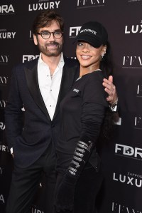 NEW YORK, NY - NOVEMBER 29:  Editorial Director of Footwear News (FN), Michael Atmore and event honoree Rihanna attend the 30th FN Achievement awards at IAC Headquarters on November 29, 2016 in New York City.  (Photo by Gary Gershoff/WireImage)